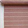 Terracotta and natural horizontal stripe textile by Kufri Life