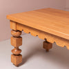 Wooden table with decorative legs by KUFRI